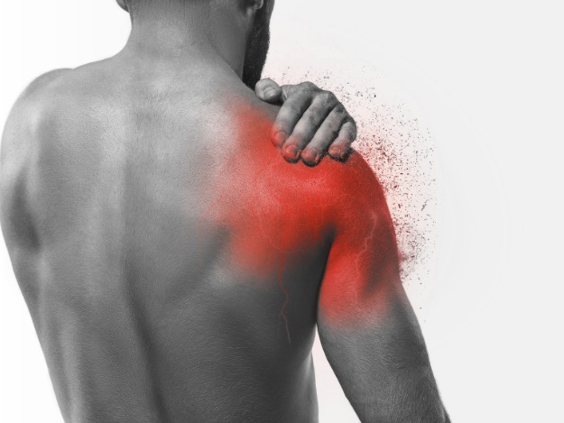 man with pain in shoulder glowing red