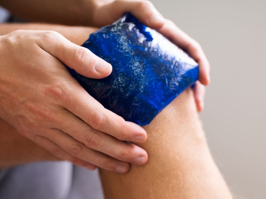 Image of a person using icepack on their knee