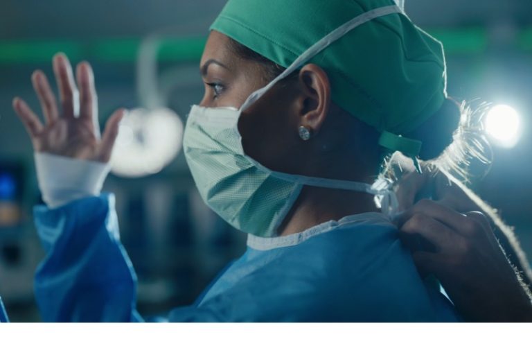 Dr Mehta in a surgery room