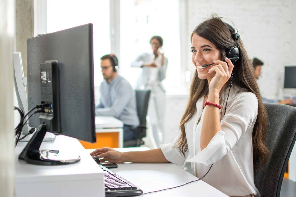 Female contact centre worker at work