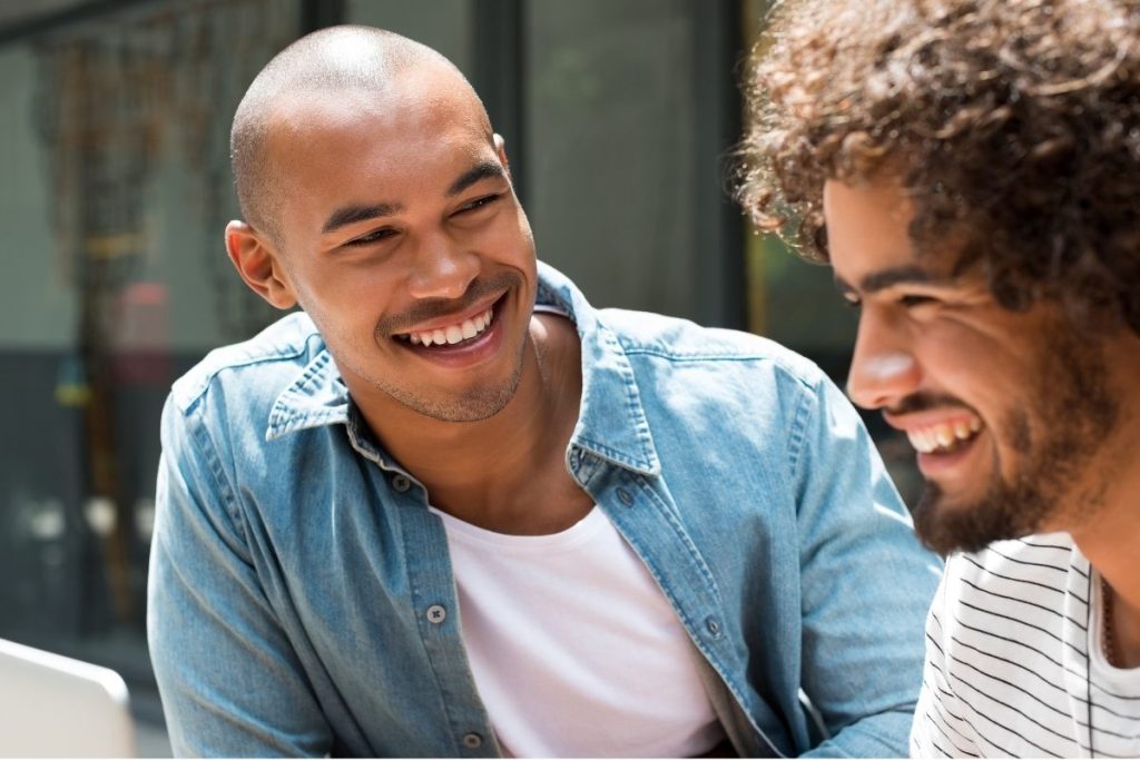Two males chatting to each other