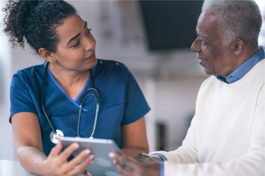Female doctor with male patient