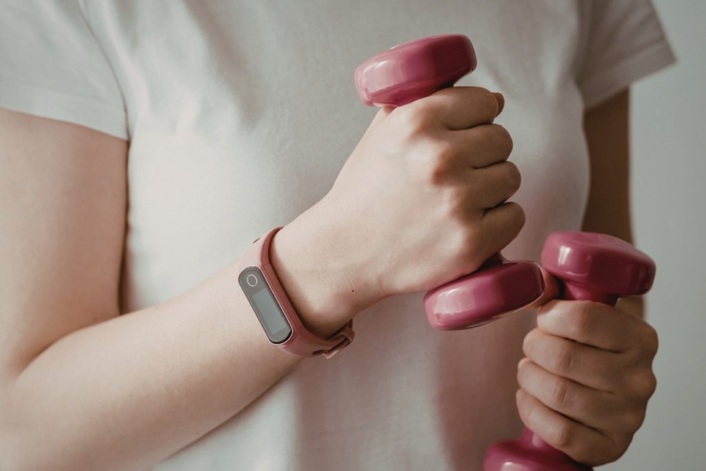 Female performing forearm exercises